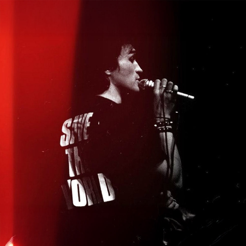 Viktor Tsoi singing in T-shirt SAVE THE WORLD (СПАСЁМ МИР). From www.kinoband.com