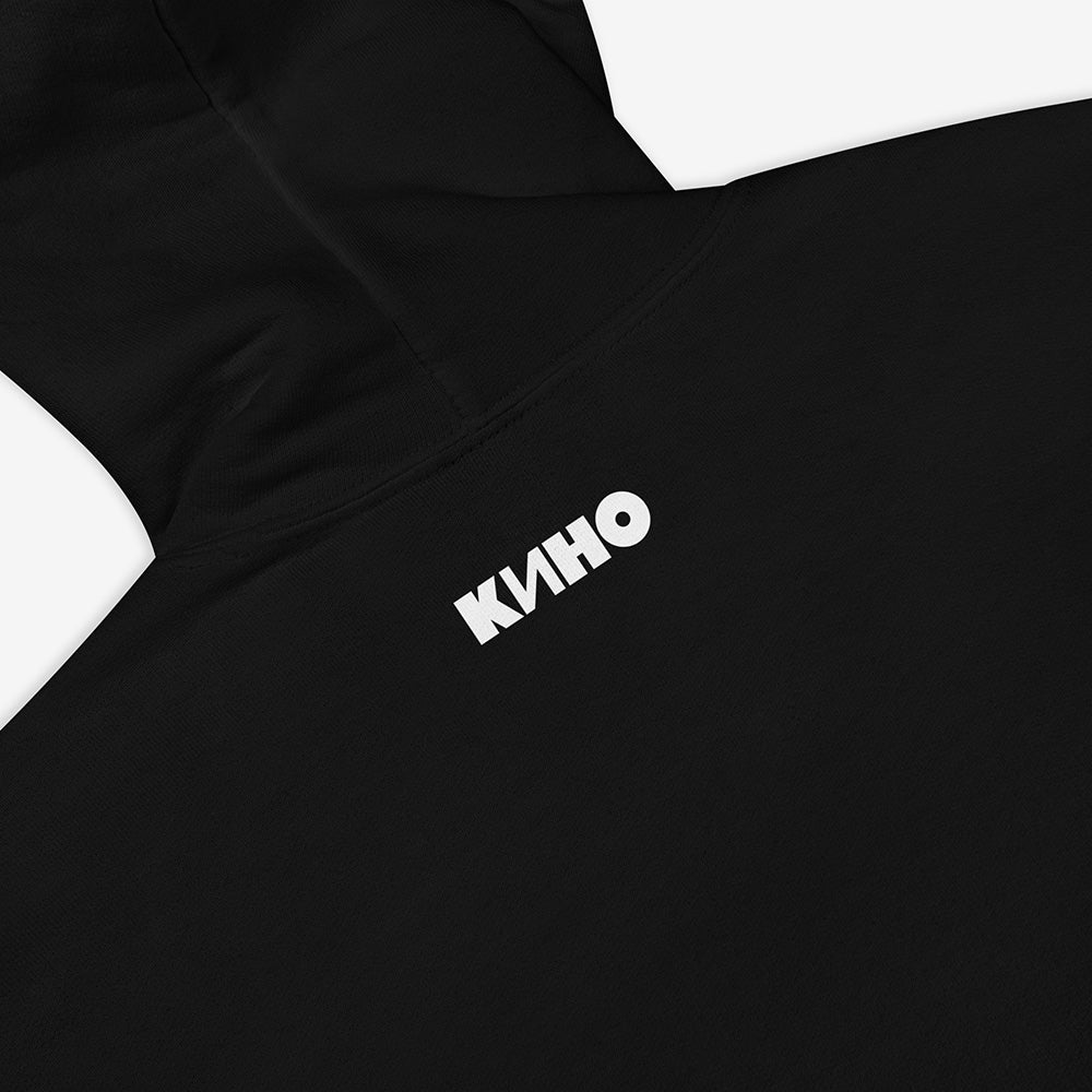 Premium unisex hoodie with original Zvezda po imeni Solntse (Star called Sun) album artwork by Viktor Tsoi and Gruppa Kino music band. With KINO logo on the back neck side. Closeup photo.