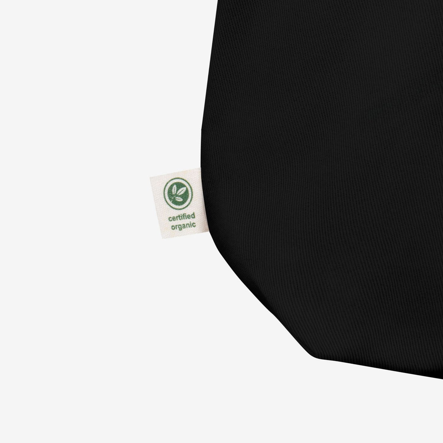 Official KINO band black tote bag featuring Star Called Sun album art on one the front  and КИНО logo on the the back. Closup detail photo with Certified Organic tag. www.kinoband.com