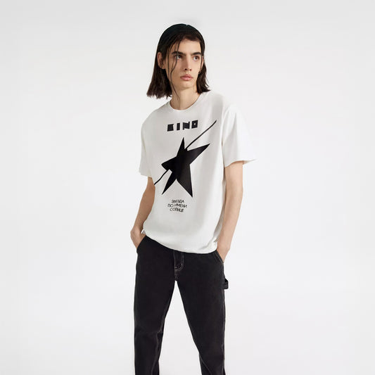 A young handsome boy model wearing official premium unisex white T-shirt with official 'A star called Sun' (Zvezda) album cover by Viktor Tsoi and Gruppa Kino band. From www.kinoband.com