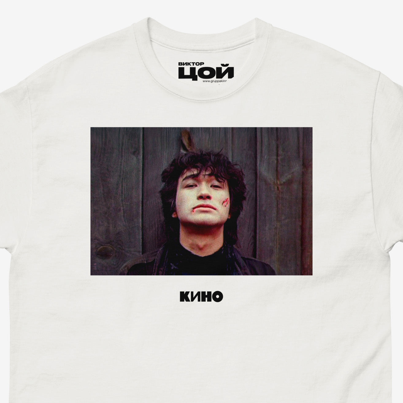 Official Viktor Tsoi Igla movie shirt with rare 1988 photo of Tsoi from Soviet film Igla. White unisex KINO band T-shirt. Closeup photo. Exclusive merch from www.kinoband.com