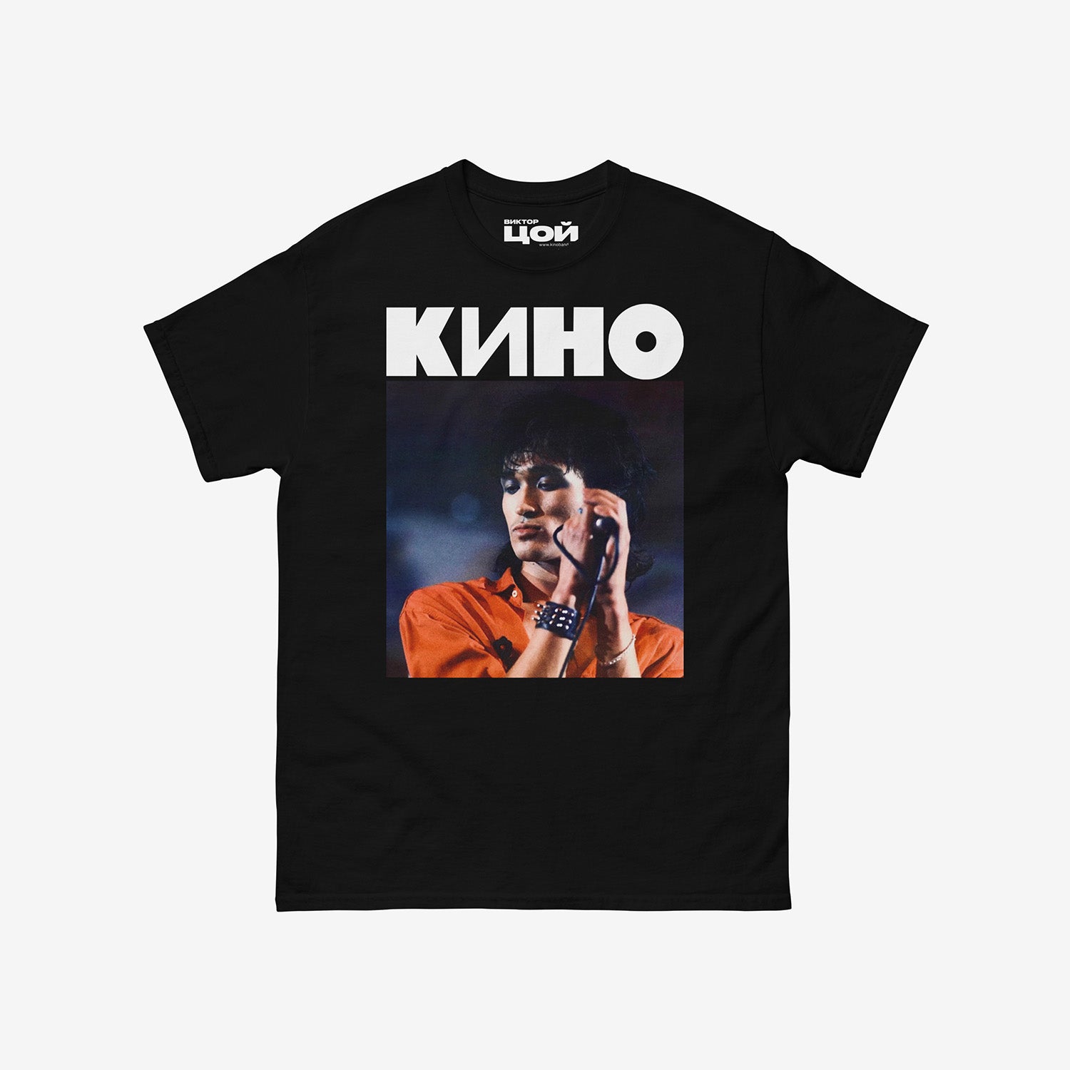 Black unisex t-shirt with a large photo of Viktor Tsoi performing live and bold KINO band logo above. From kinoband.com