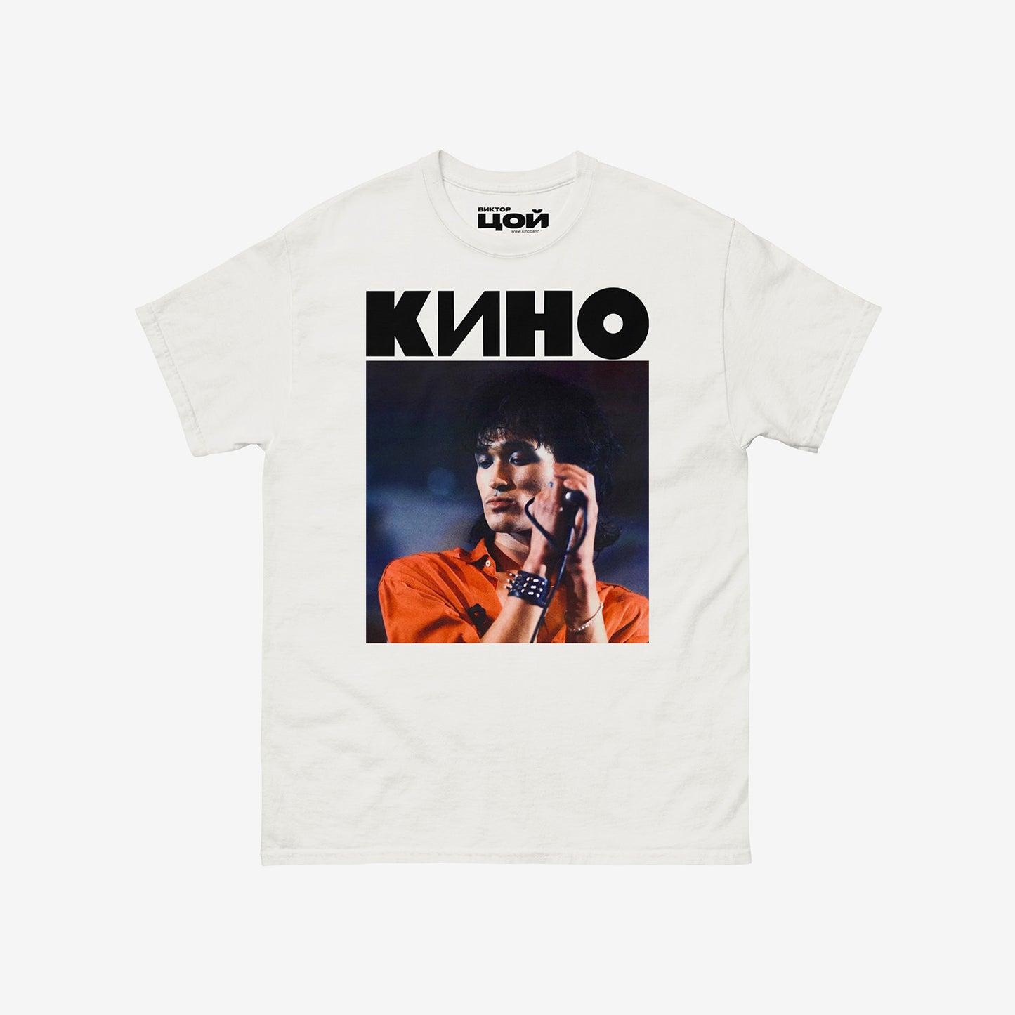 White t-shirt with large photo of Viktor Tsoi performing live and bold KINO band logo above. From kinoband.com