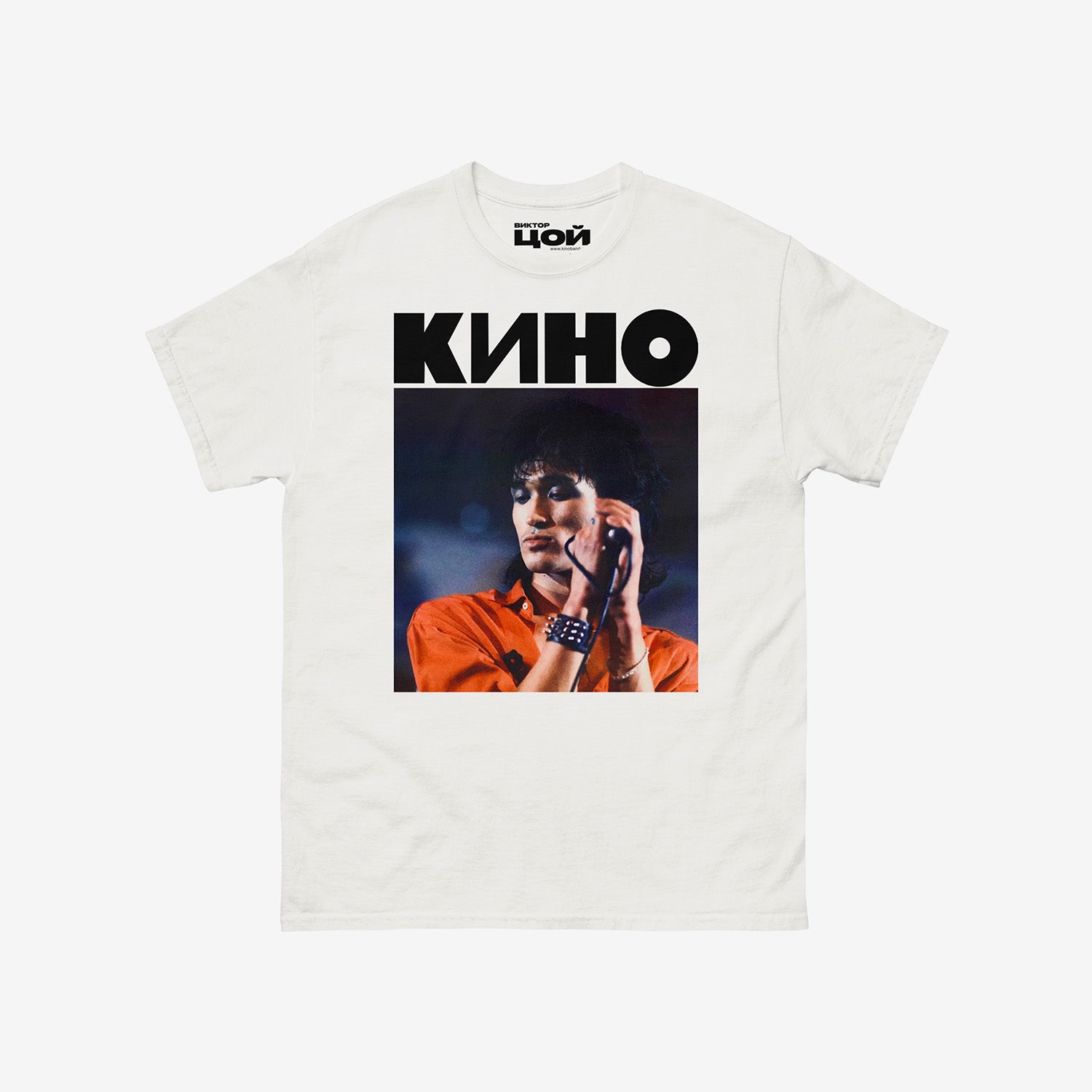 White t-shirt with large photo of Viktor Tsoi performing live and bold KINO band logo above. From kinoband.com