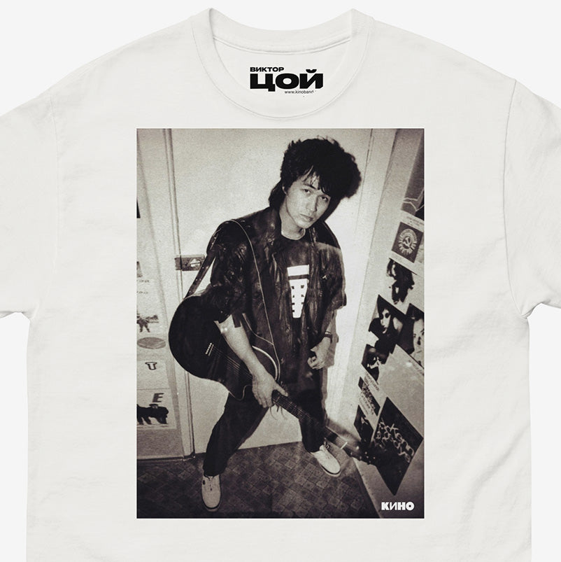 Official KINO band tshirt with large rare photo of Viktor Tsoi in wearing a bomber jacket with guitar in an apartment. Closeup photo. From kinoband.com