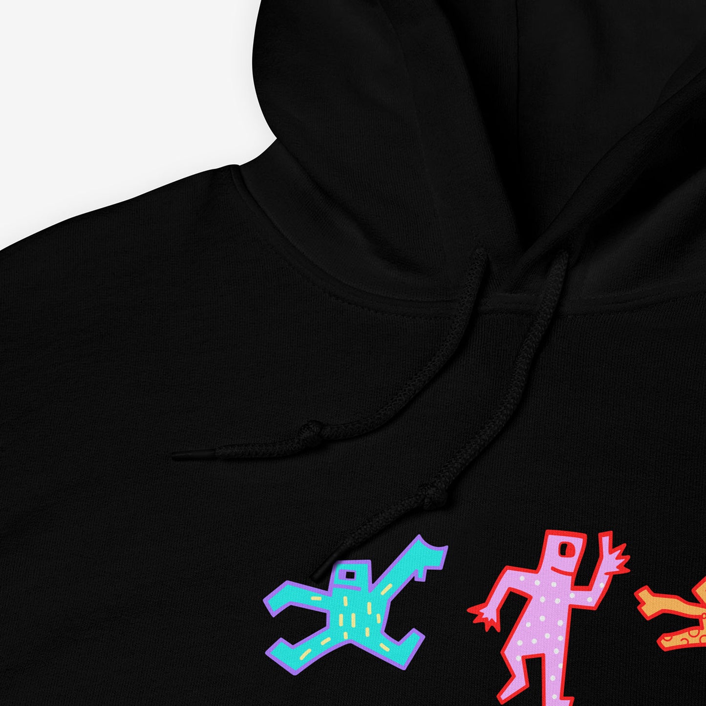Official black unisex KINO band hoodie featuring an original colorful painting by Viktor Tsoi with a small КИНО logo underneath, with small "Виктор Цой” logo in Cyrillic on the back. Front side closeup photo. www.kinoband.com
